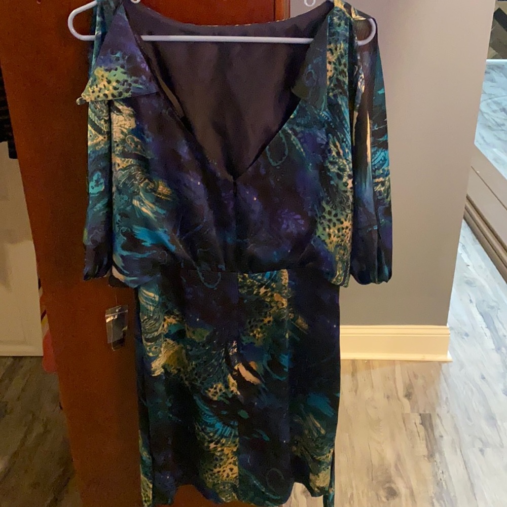 Navel and teal dress